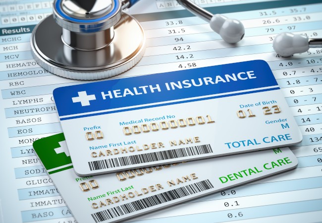 Health insurance on top of dental insurance card