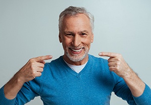 Older man wearing dentures