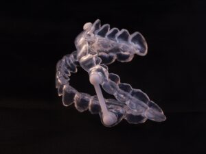 Oral appliance on a black background