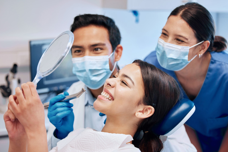 Patient smiling after getting veneers